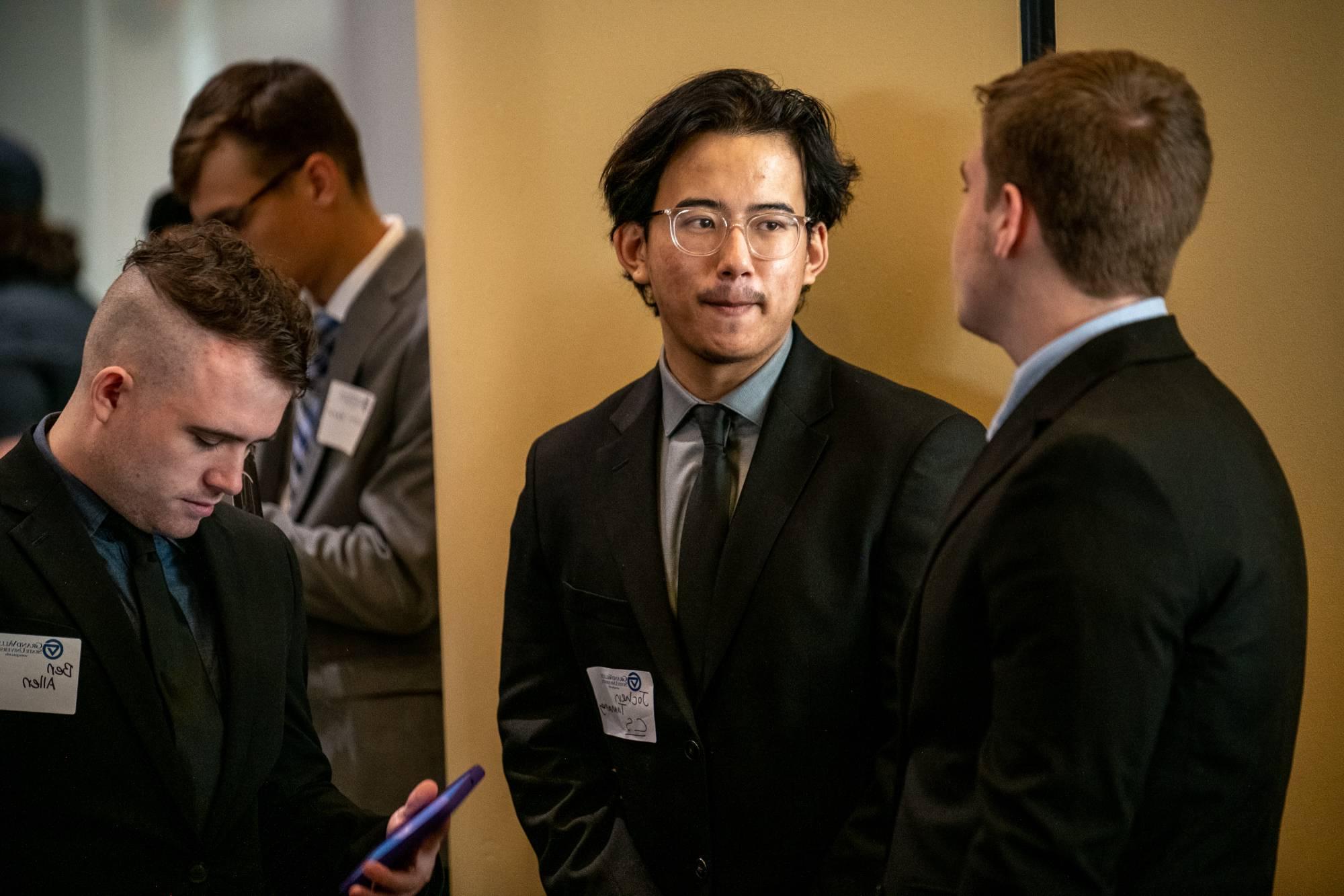 people talking at the career fair